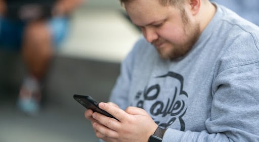man using his mobile phone